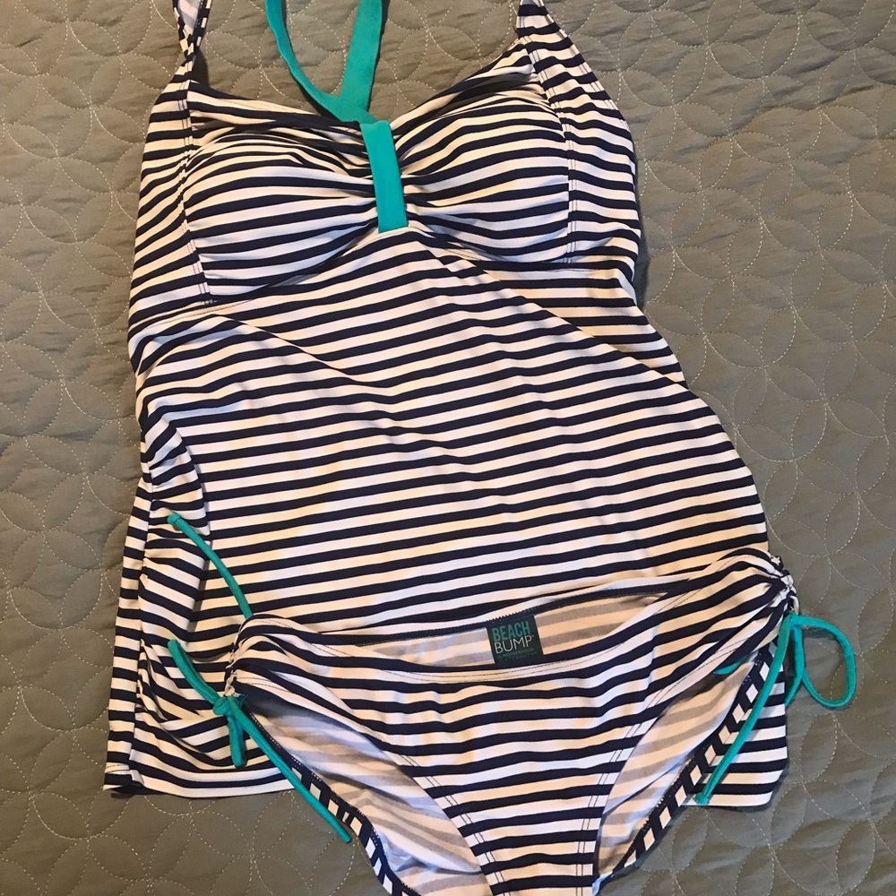 Two piece maternity swim. Straps cross in back, side ruching and ties on bottom.